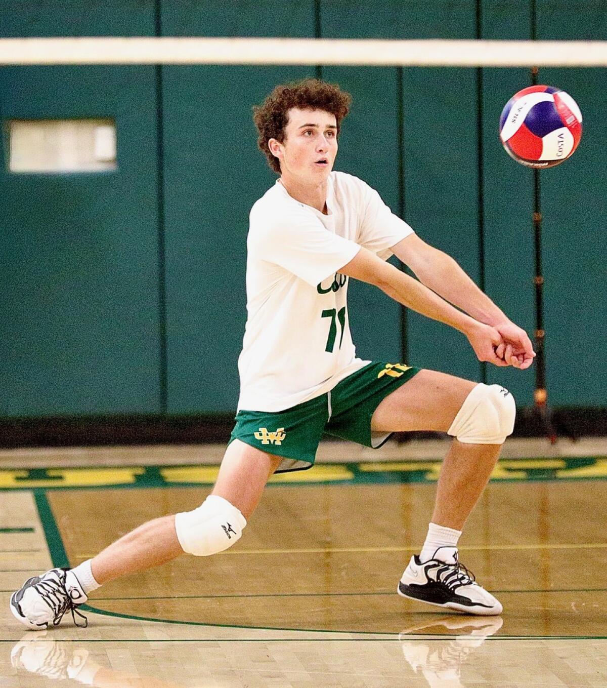 Mira Costa libero Dane Del Riego returns a serve in a four-set victory over Redondo Union.