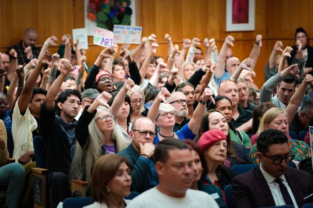 San Diegans react to Mayor Todd Gloria as he appears at the San Diego City Council meeting on Monday, April 20, 2026, in downtown San Diego to present his proposed budget for fiscal year 2027. (Nelvin C. Cepeda / The San Diego Union-Tribune)