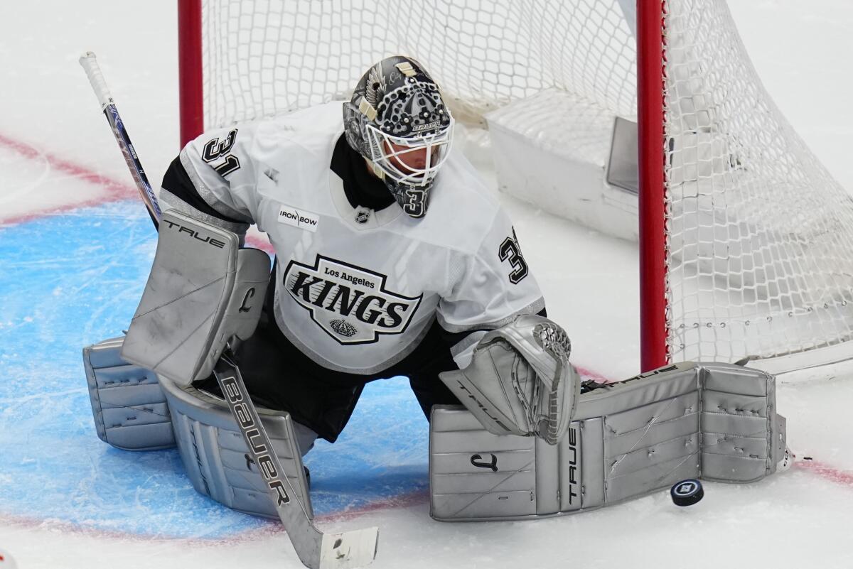 Kings goaltender Anton Forsberg makes a save during overtime of Game 2.