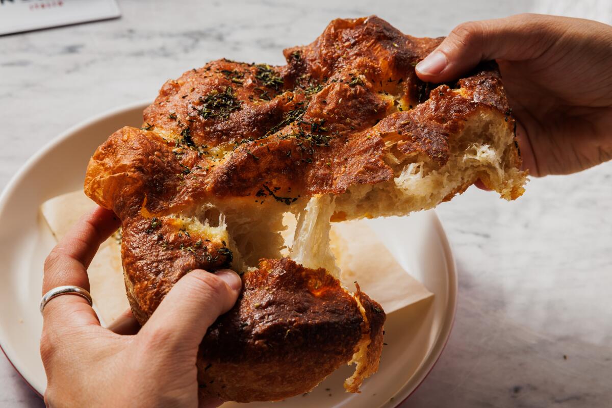 Freshly baked focaccia bread at North Italia Brea.