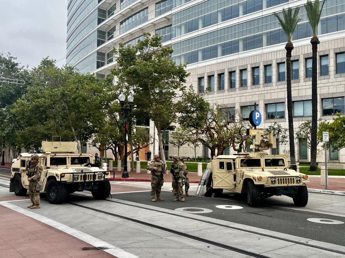 National Guardsmen stationed in front of the Ronald Reagan Federal Building and U.S. Courthouse in Santa Ana last year.