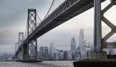 Wild video shows person dangling off Bay Bridge to avoid police