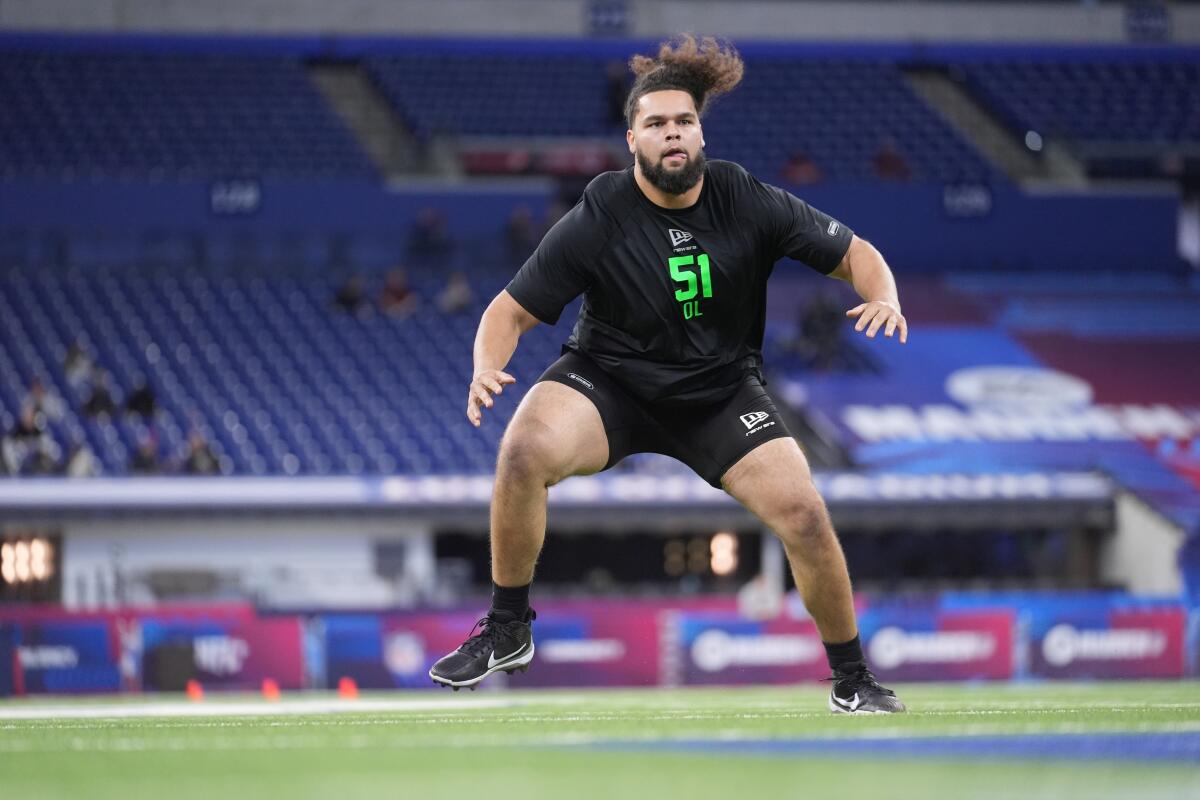 Missouri offensive lineman Keagen Trost runs a drill at the NFL scouting combine on March 1.