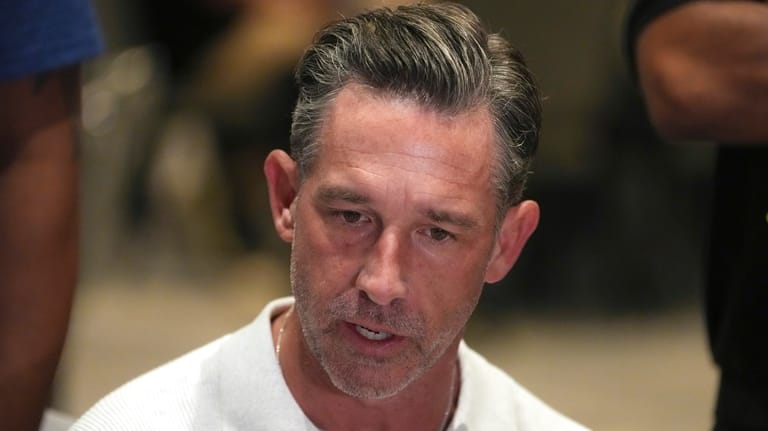 San Francisco 49ers head coach Kyle Shanahan speaks to reporters...