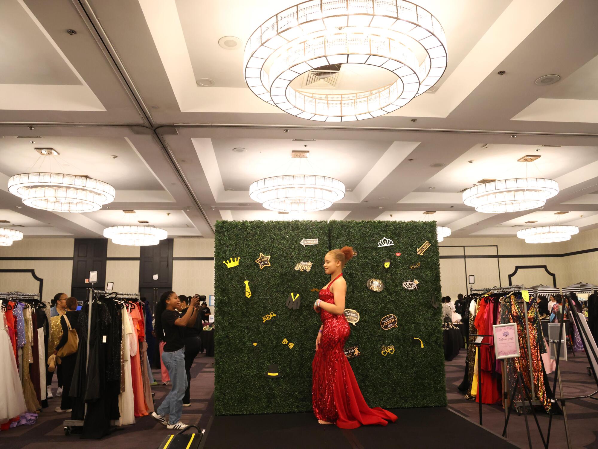 Marie Klein, 18, from Crenshaw High School, models her new prom dress.