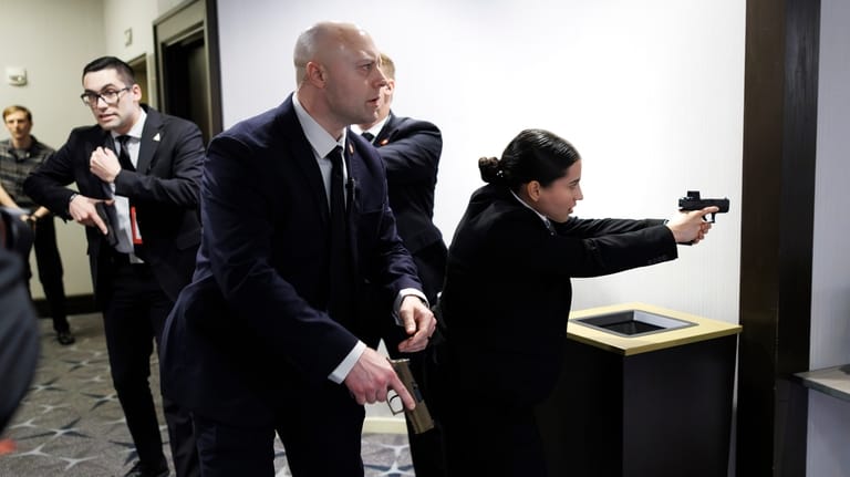 Members of law enforcement respond during the White House Correspondents...