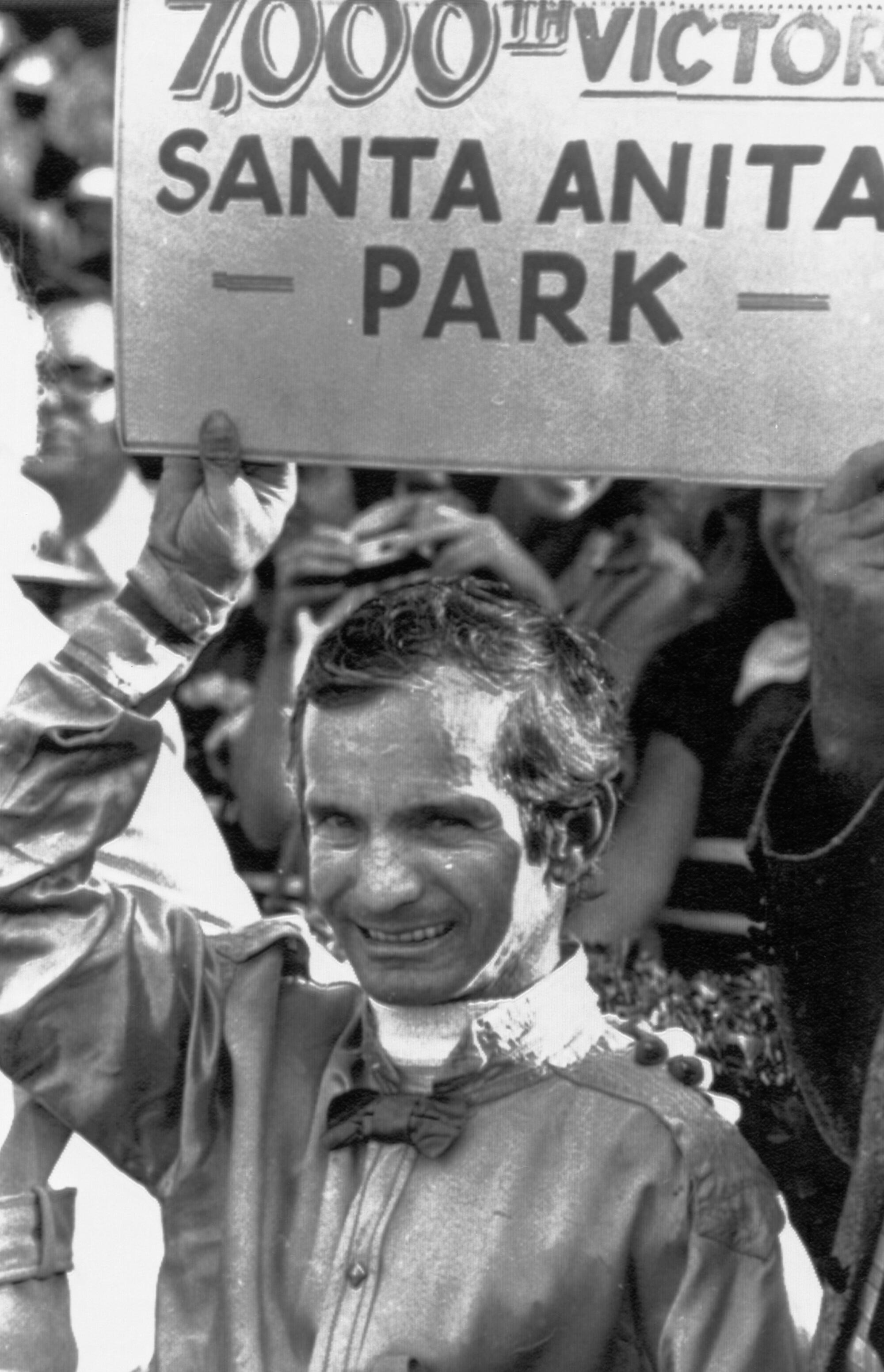 Billly Shoemaker is in the winner's circle at Santa Anita in March 1976 after winning his 7,000th race.