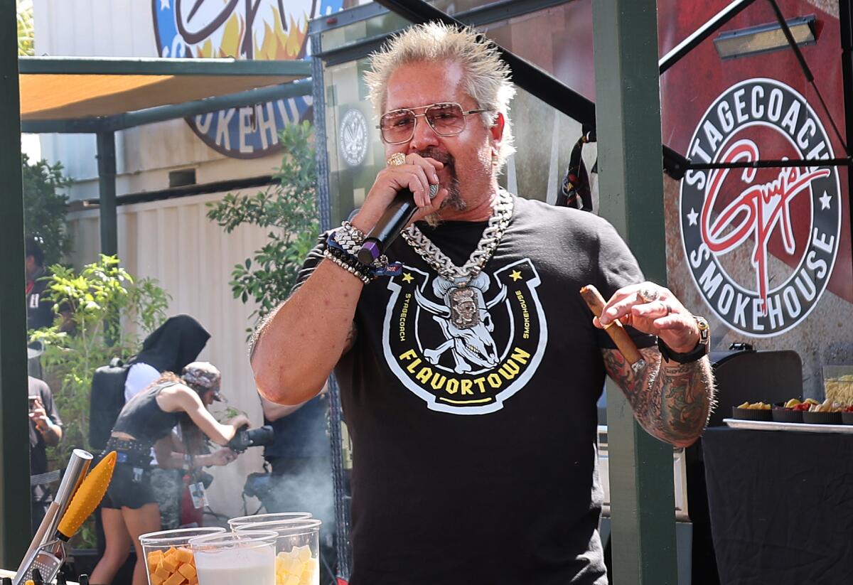 Guy Fieri features his latest smokehouse dish during the Stagecoach 