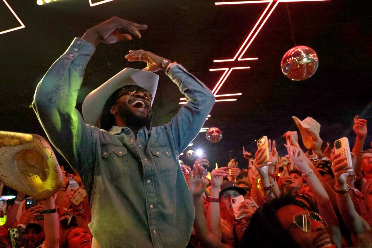 Shaboozey joins the crowd at Diplo's Honky Tonk at Stagecoach