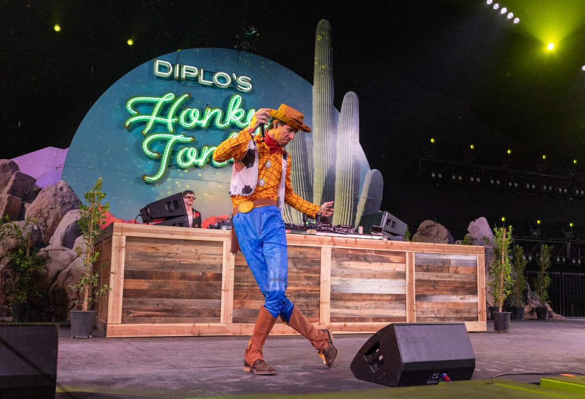 3OH!3 members dressed like Woody from Toy Story to perform at Stagecoach at Diplo's Honky Tonk