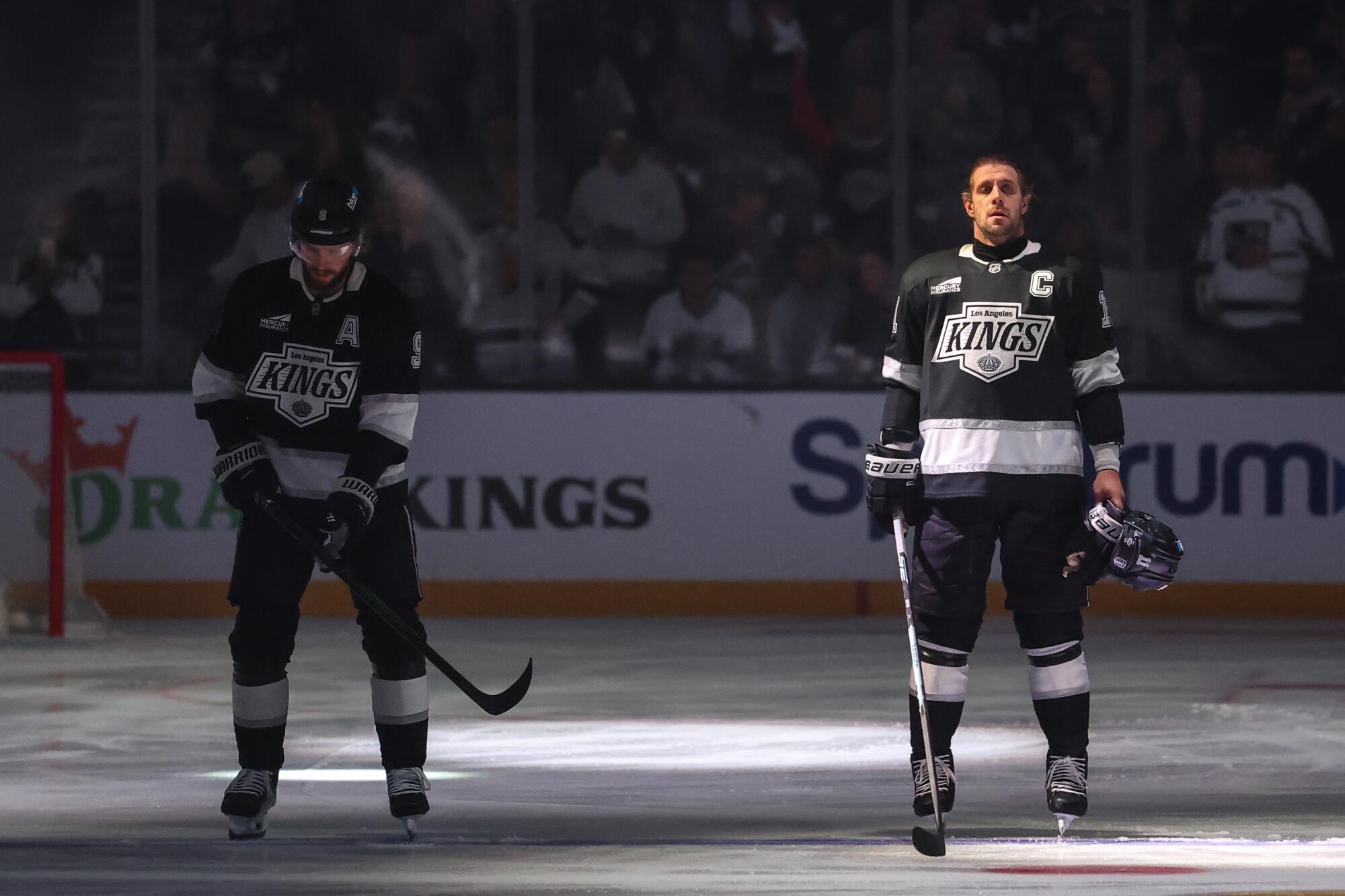 Kings captain Anze Kopitar stands on the ice during the national anthem before Game 4 against the Colorado Avalanche.