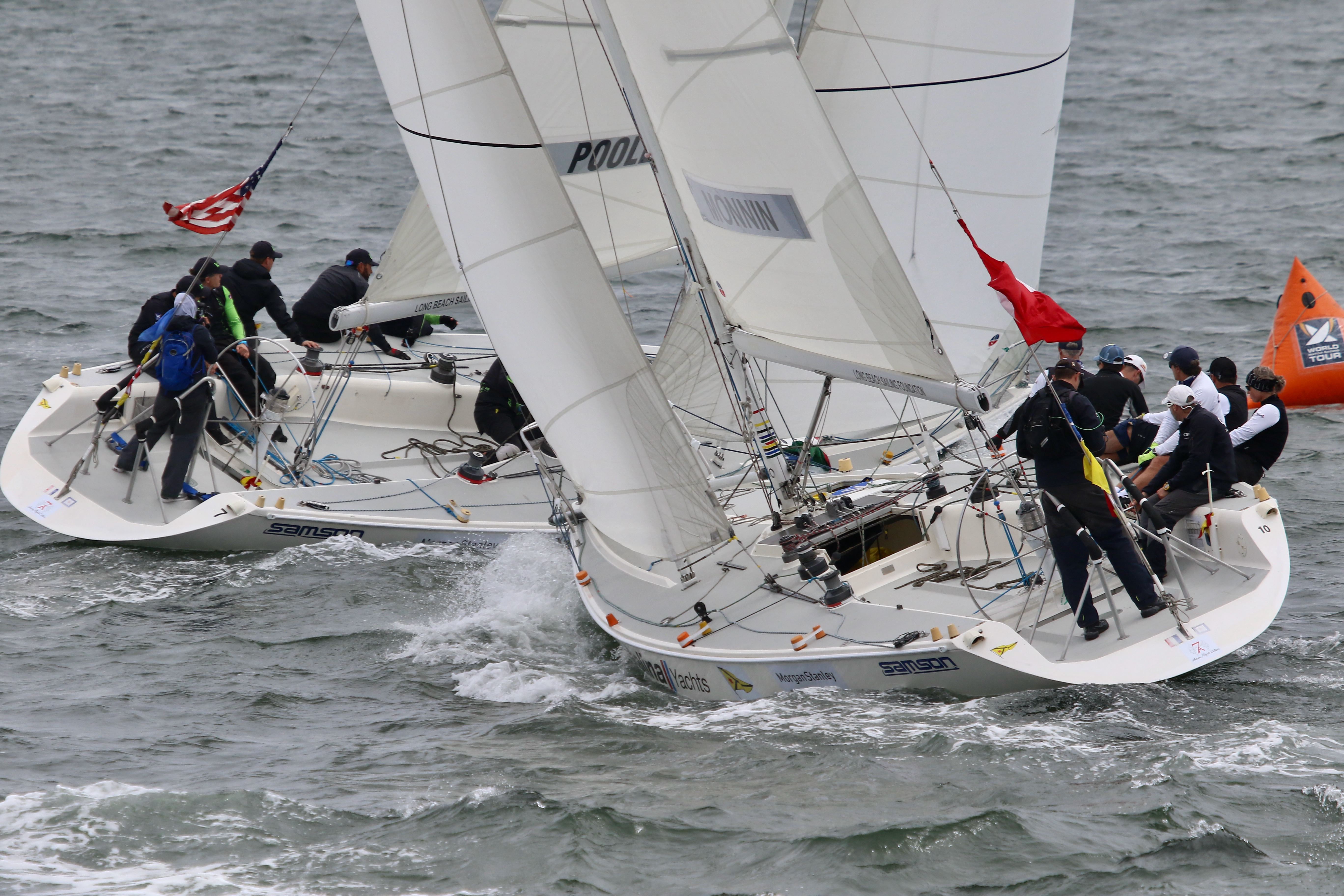 A Swiss team, left, led by Eric Monnin goes on...