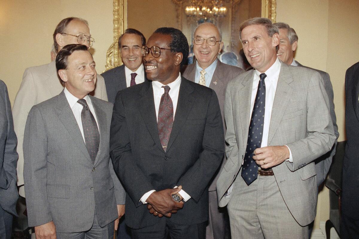 Supreme Court Justice nominee Clarence Thomas with republican senators John Seymour, R-Calif., Larry Craig, R-Idaho.