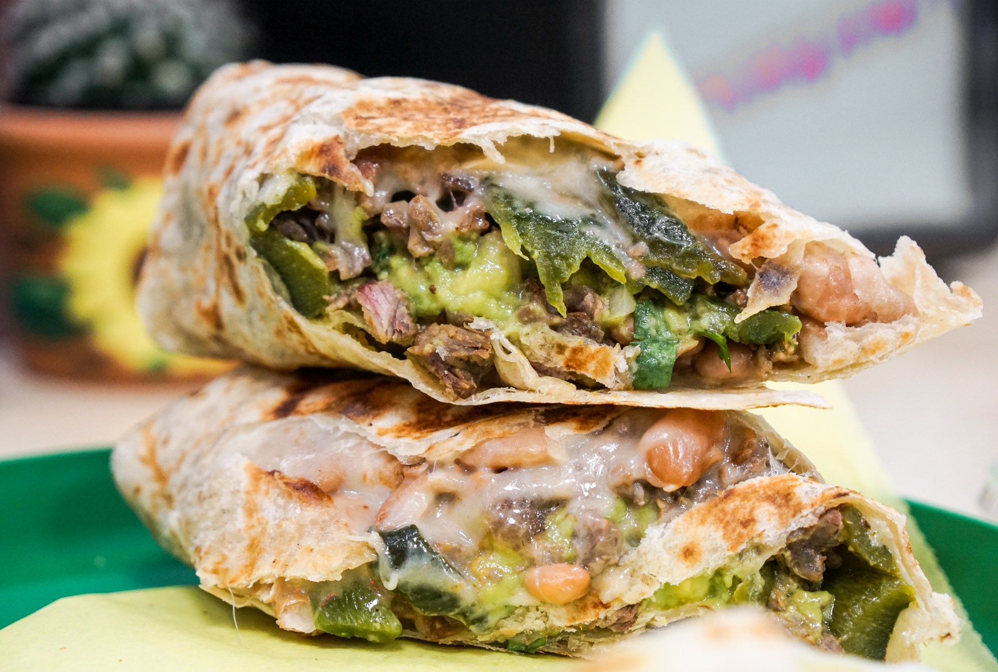 Inside look of a burrito at Sonoratown stuffed with chiles.