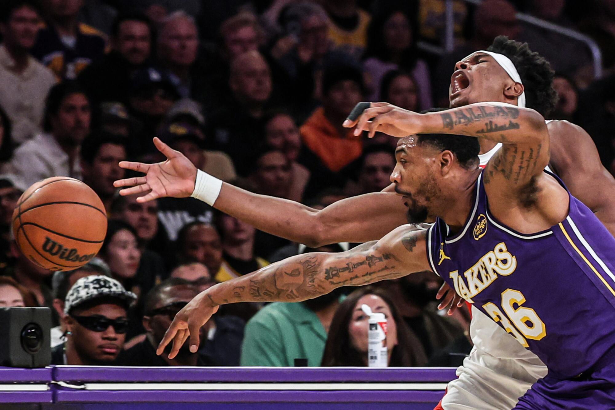 Lakers guard Marcus Smart knocks the ball away from Rockets guard Amen Thompson during Game 5 at Crypto.Com Arena.