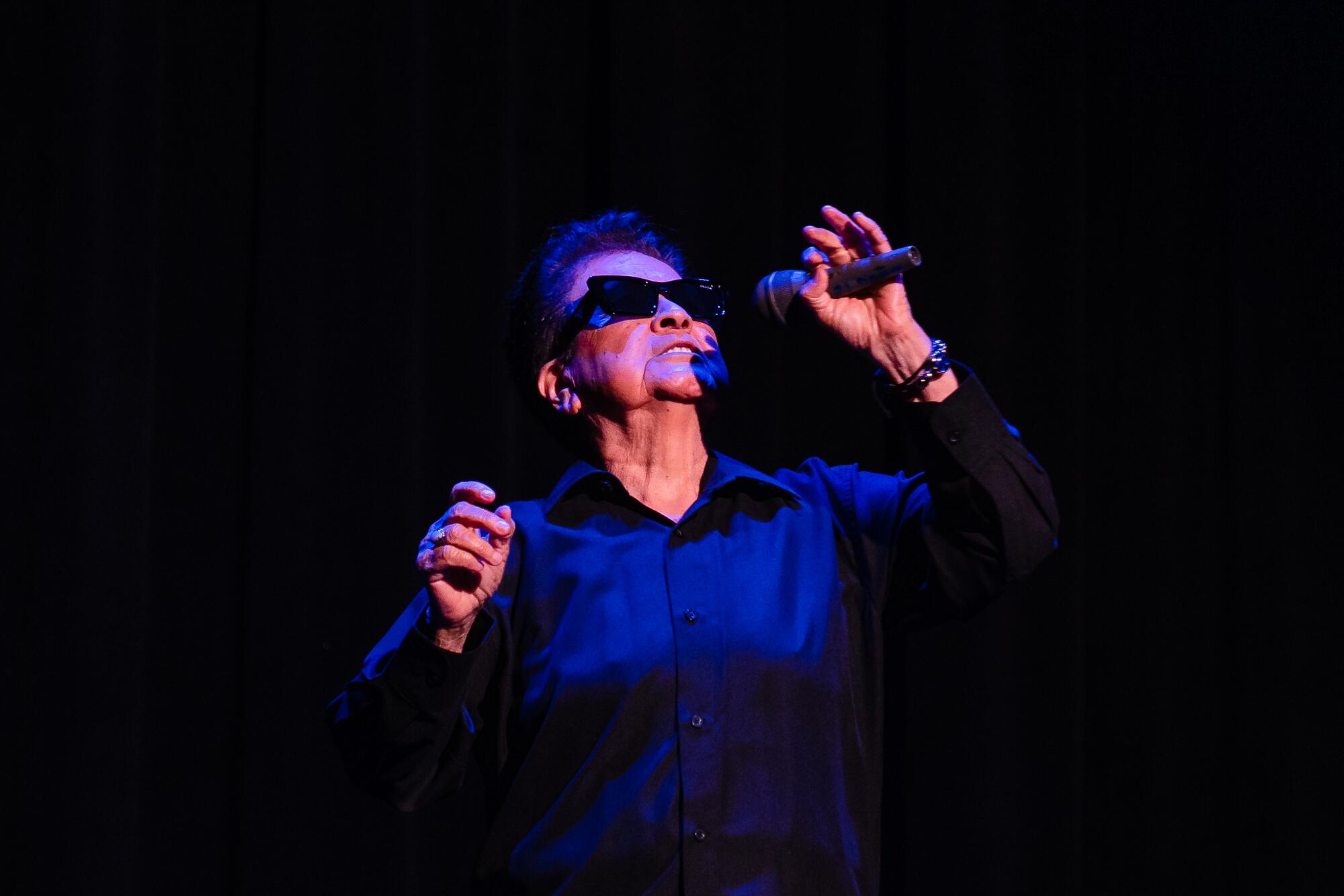El Daña dressed as Tom Jones while lip-syncing his version of "Kiss" at the Barnsdall Gallery Theatre on April 22, 2026.  
