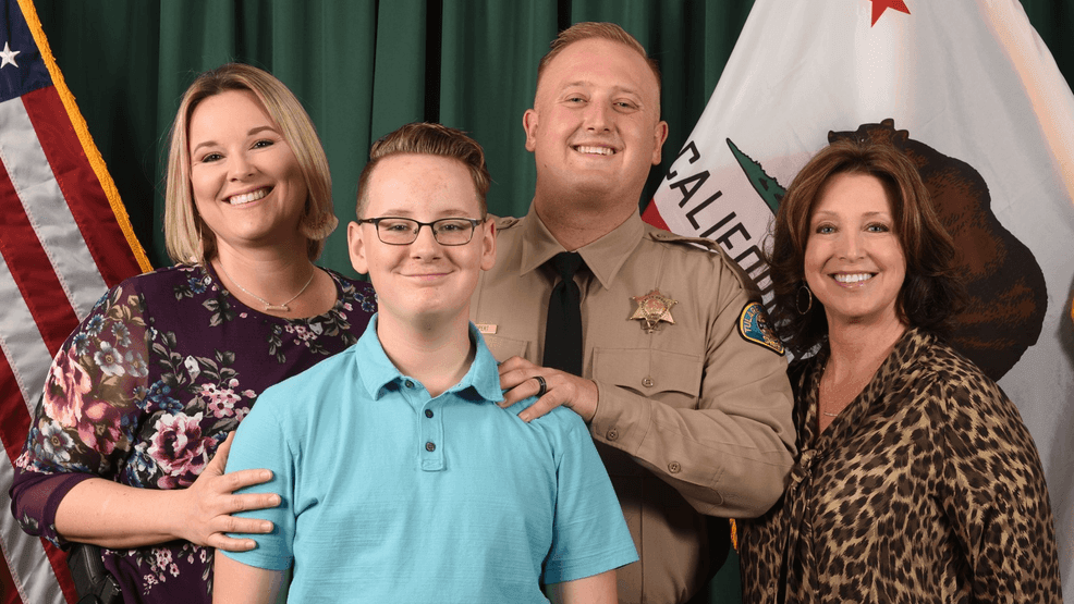 FILE - Tulare County Detective Randy Hoppert with his family (Photo: Tulare County Sheriff's Office){p}{/p}