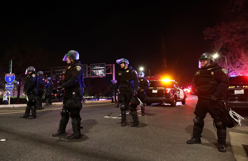 California Highway Patrol officers blocking an entrance to Interstate 5.