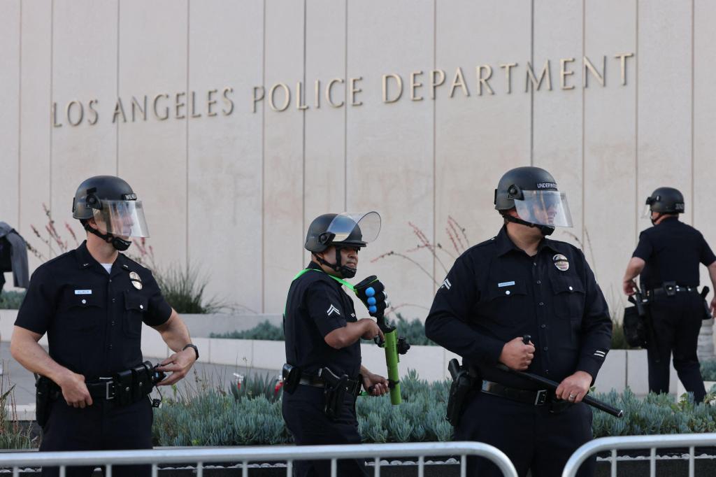 LAPD officers guard the Los Angeles Police Department headquarters during a protest.