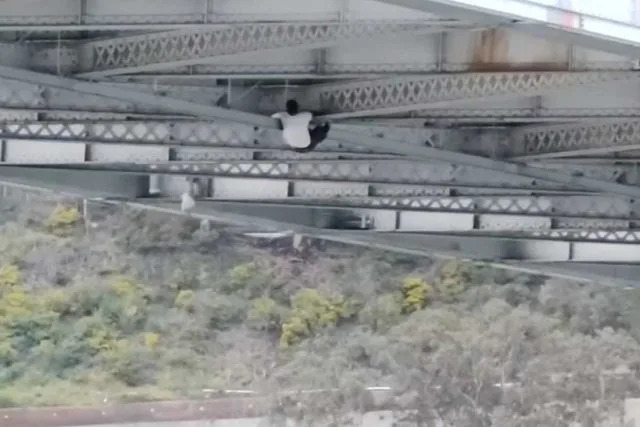 The suspect climbing under Bay BridgeCredit: San Francisco Police Department
