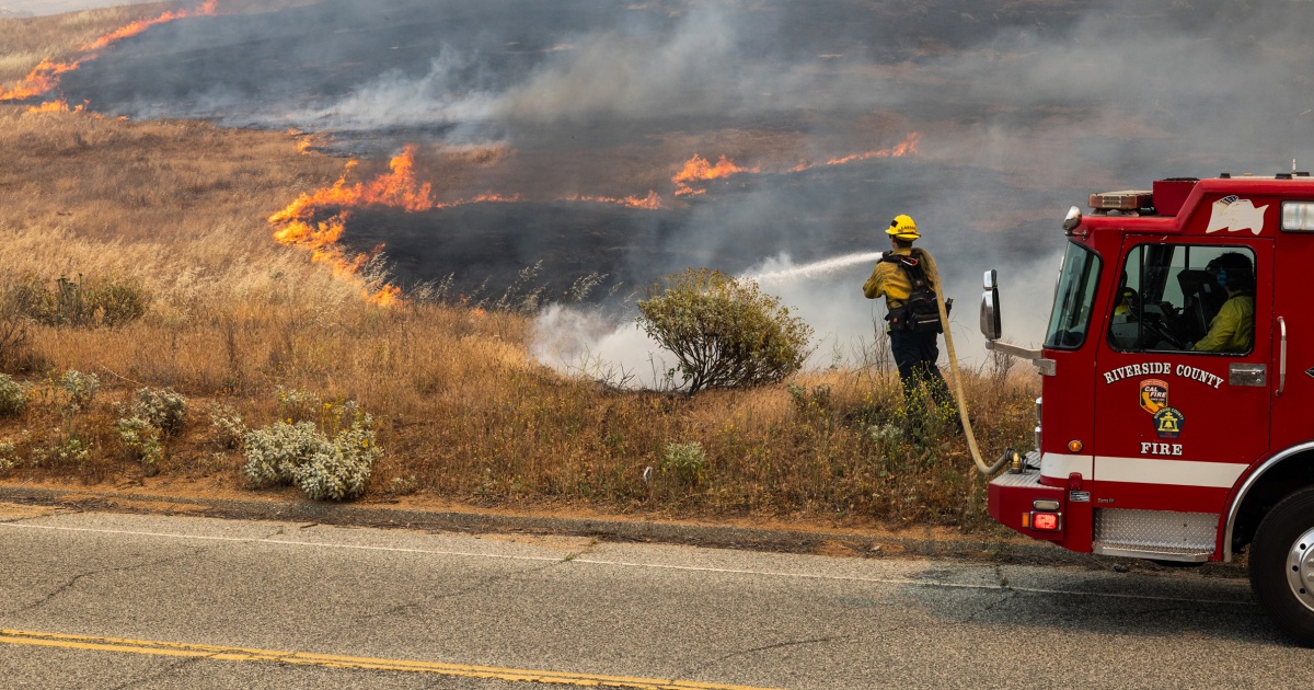 A fast-growing wildfire in windy Southern California triggers evacuations