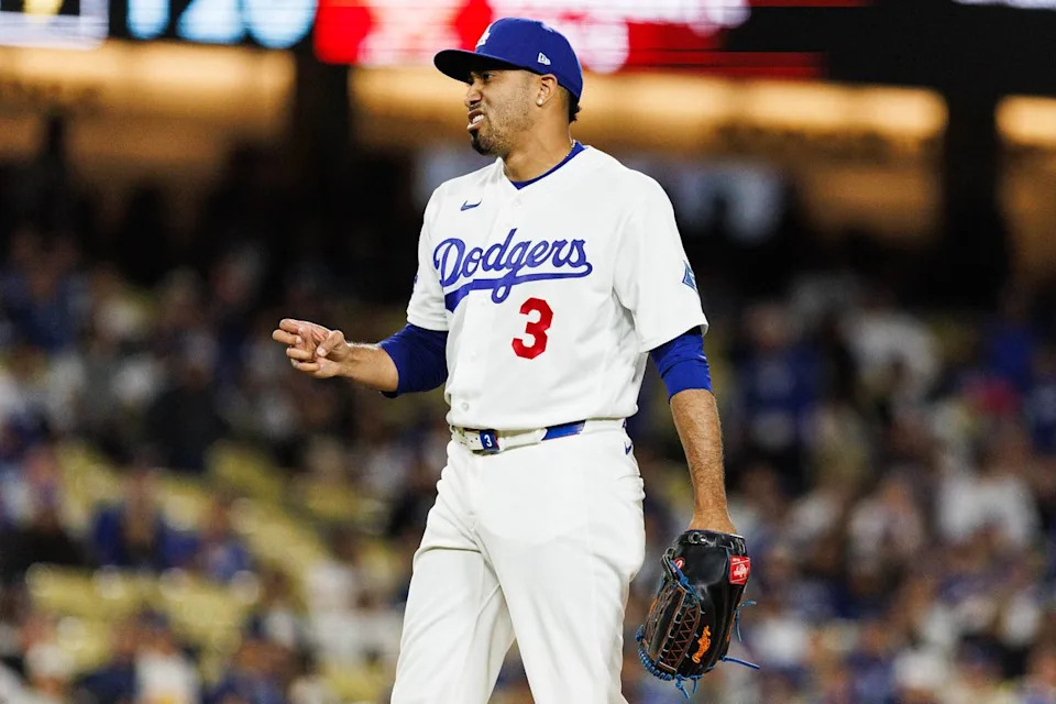 Edwin Díaz #3 of the Los Angeles Dodgers signals a strike during an MLB game against the Texas Rangers at Dodger Stadium on April 10, 2026 in Los Angeles, California.