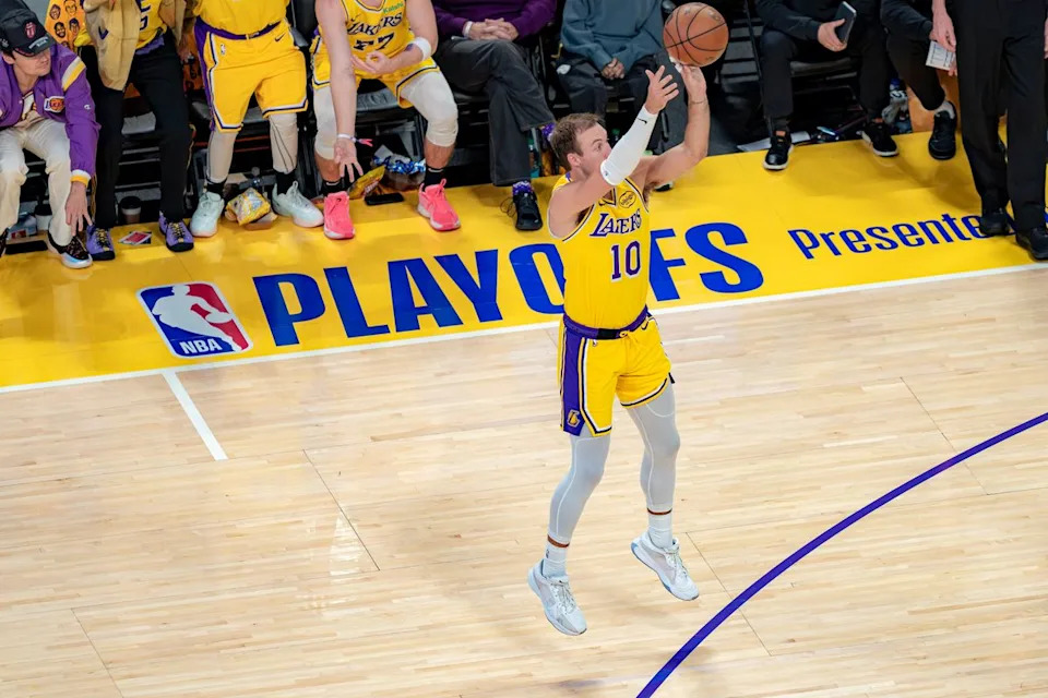 Los Angeles Lakers guard Luke Kennard (10) shoots a three pointer during an NBA basketball game against the Houston Rockets on April 18th, 2026 in Los Angeles, CA.