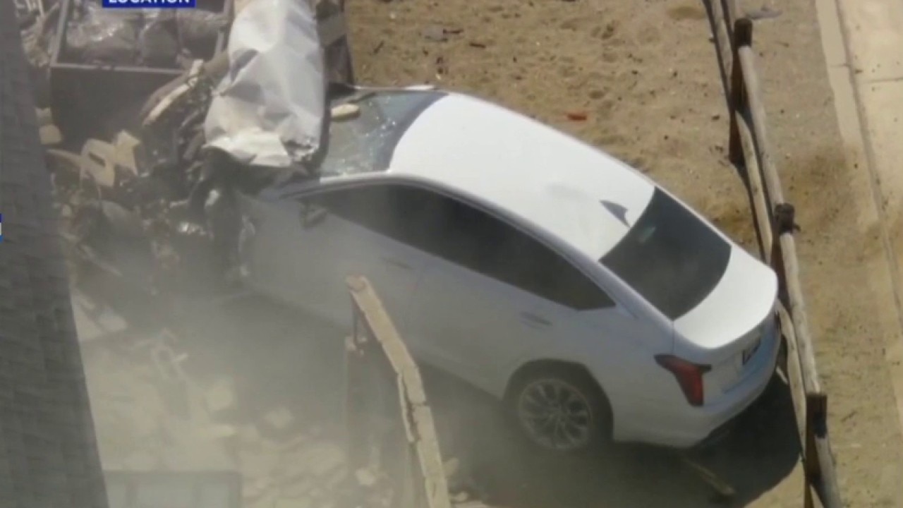 Standoff continues after police chase ends in crash