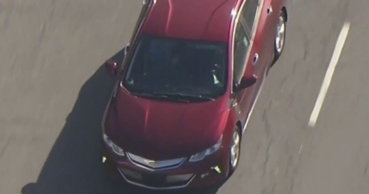 Man in red car leads half-hour police chase across Los Angeles