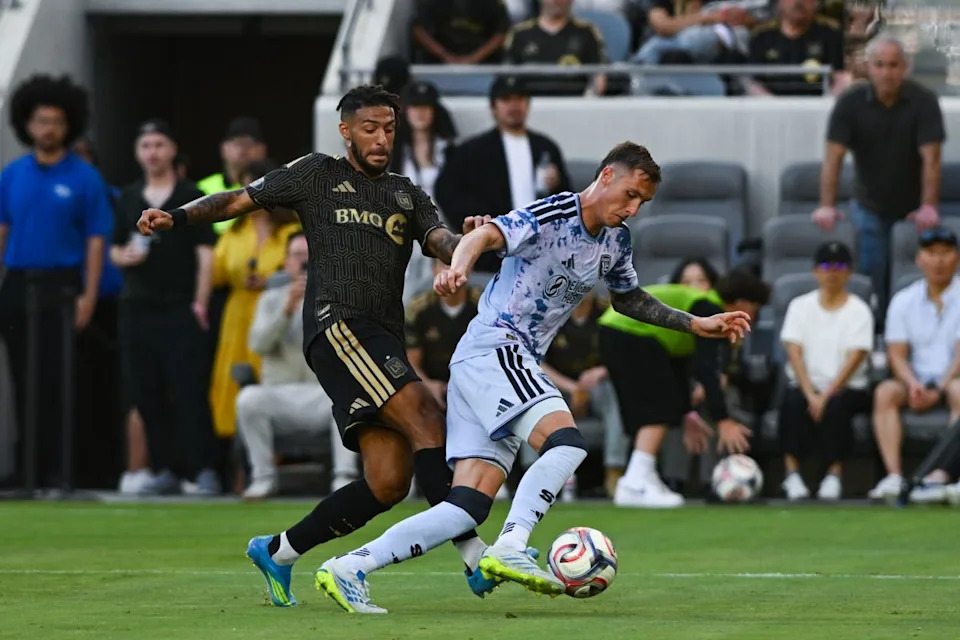 LAFC forward Denis Bouanga (99) battles for possession during an MLS game between LAFC and San Jose Earthquakes on Sunday, April 19, 2026 at BMO Stadium In Los Angeles Calif at BMO Stadium in Los Angeles Calif
