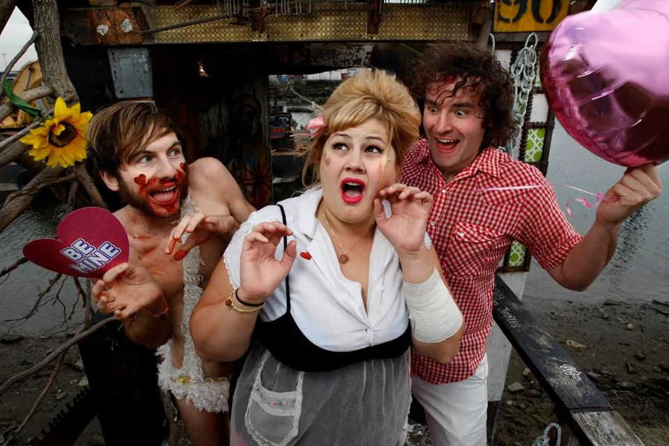 Shannon Shaw, (center), Cody Blanchard, (left) and Ian Amberson,(right) are the rock grop, "Shannon and the Clams", the three in Oakland, Calif. on Wednesday Feb. 4, 2009, along the Oakland Estuary at the 5th Street marina.