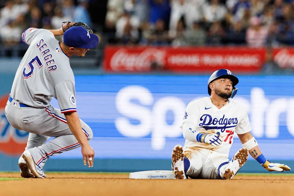 Miguel Rojas #72 of the Los Angeles Dodgers reacts after getting caught stealing second base during an MLB game against the Texas Rangers at Dodger Stadium on April 10, 2026 in Los Angeles, California.
