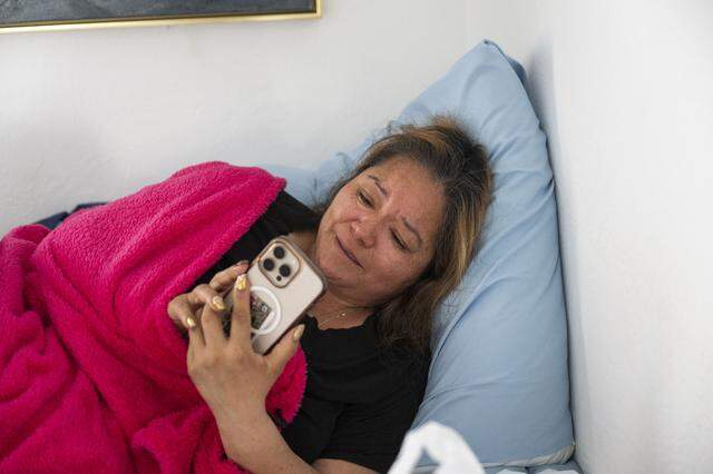 Maria de Jesus Estrada Juarez video chats with her daughter Damaris Bello as Estrada Juarez, a DACA recipient that was deported in February to Mexico, waits to return to the United States on Monday, March 30, 2026. 