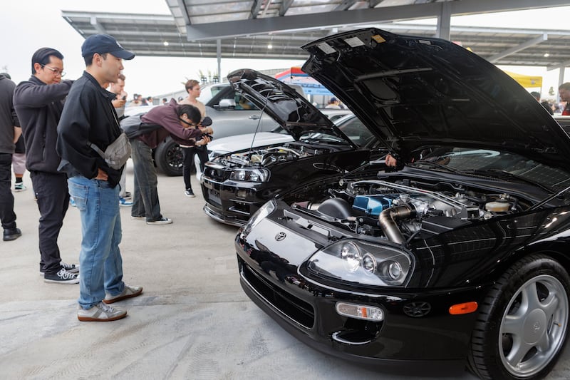 Cars displaying their engine bays