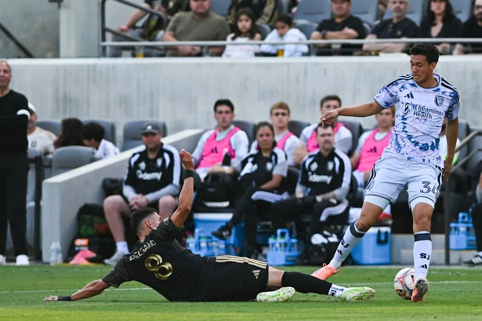 LAFC midfielder Mark Delgado (8) slides for an interception during an MLS game between LAFC and San Jose Earthquakes on Sunday, April 19, 2026 at BMO Stadium In Los Angeles Calif at BMO Stadium in Los Angeles Calif