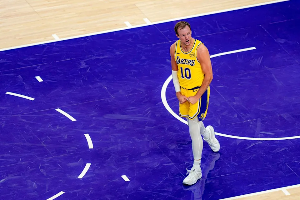Los Angeles Lakers guard Luke Kennard (10) celebrating repeated threes during an NBA basketball game against the Houston Rockets on April 18th, 2026 in Los Angeles, CA.