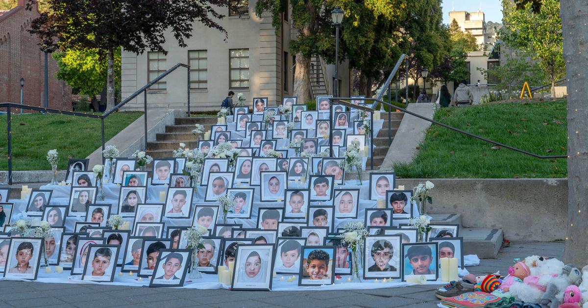 Students hold candlelight vigil, mourn children killed in US missile strike on Iranian school | Campus
