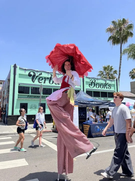 A person walking on stilts