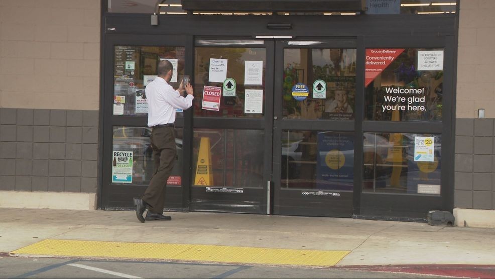 The Albertsons on Brundage Lane is closed, with signs on the window saying it was due to an inspection grade by Kern County Public Health and a power outage. PHOTO: KBAK/KBFX