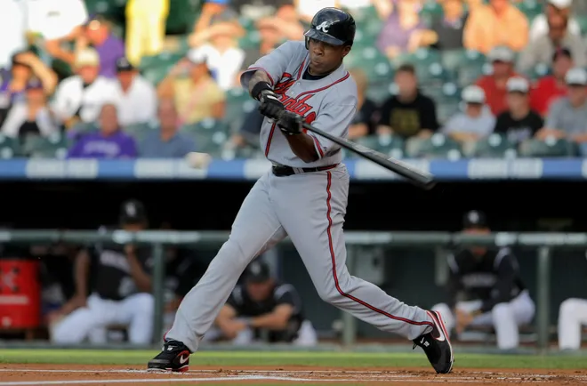 DENVER - JULY 09: Garret Anderson #18 of the Atlanta Braves takes an at bat against the Colorado Rockies during MLB action at Coors Field on July 9, 2009 in Denver, Colorado. The Rockies defeated the Braves 7-6.