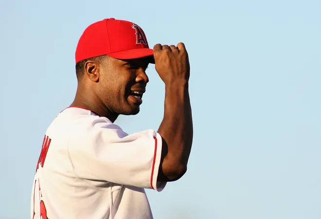 ANAHEIM, CA - AUGUST 08: Garret Anderson #16 of the Los Angeles Angels of Anaheim warms up before the game against the New York Yankees at Angel Stadium on August 8, 2008 in Anaheim, California. The Angels defeated the Yankees 10-5.