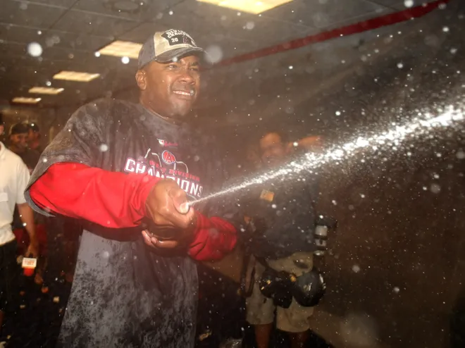 ANAHEIM, CA - SEPTEMBER 10: Garret Anderson #16 of the Los Angeles Angels of Anaheim sprays champagne in the locker room as they celebrate clinching the American League Western Division after the game with the New York Yankees on September 10, 2008 at Angel Stadium in Anaheim, California. The Angels won 4-2.