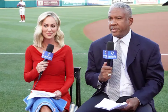 May 9, 2025; Anaheim, California, USA; FanDuel Sports Network West reporter Erica Weston (left) and Angels Live analyst Garret Anderson during the game between the Baltimore Orioles and the Los Angeles Angels at Angel Stadium.