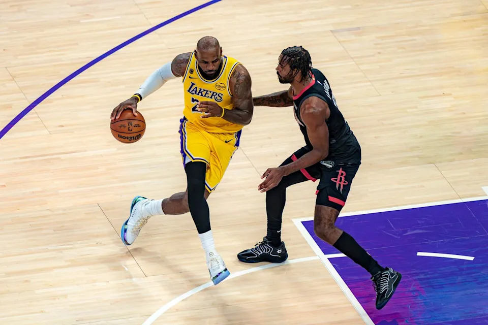 Los Angeles Lakers forward LeBron James (23) dribbling past a rockets guard during an NBA basketball game against the Houston Rockets on April 18th, 2026 in Los Angeles, CA.