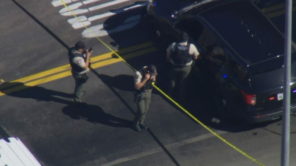 Law enforcement work the scene of a reported shooting in Stanislaus County, California, on Tuesday. - KCRA