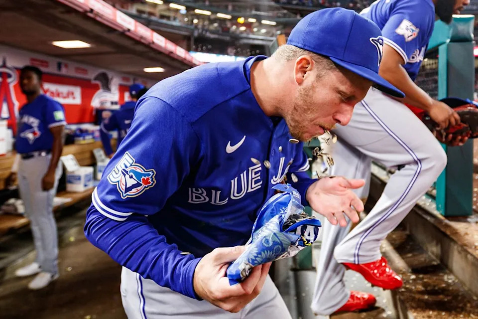 Myles Straw #3 of the Toronto Blue Jays eats seeds during an MLB game against the Los Angeles Angels at Angel Stadium on April 21, 2026 in Anaheim, California.