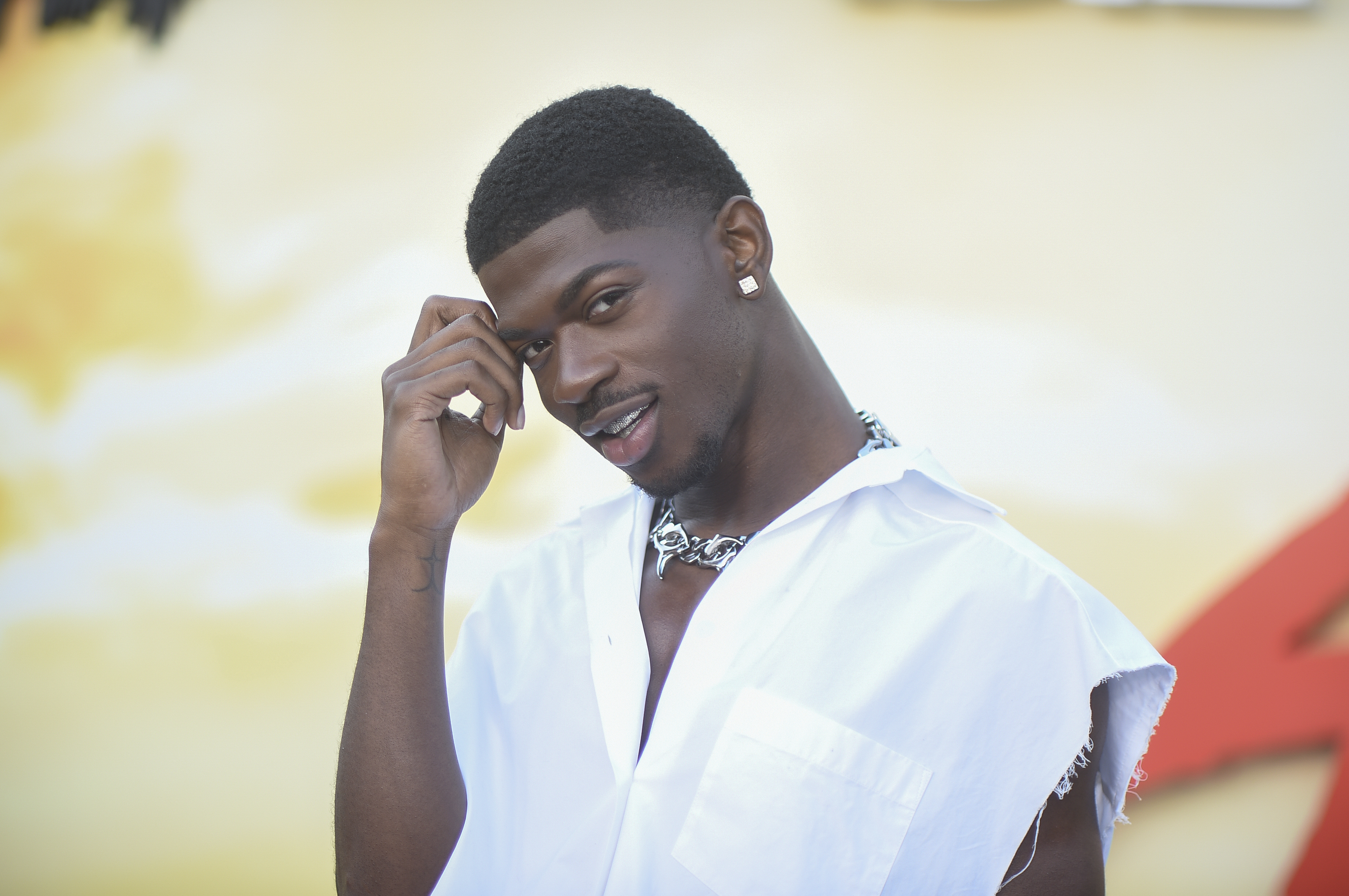 Lil Nas X arrives at the premiere of “Beverly Hills...