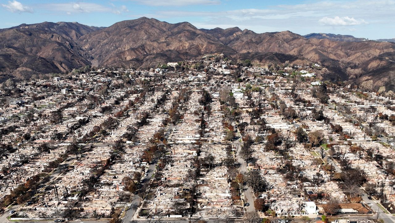 The devastation from the Palisades Fire is visible in the Pacific Palisades neighborhood of Los Angeles, Jan. 27, 2025. (AP Photo/Jae C. Hong, File)