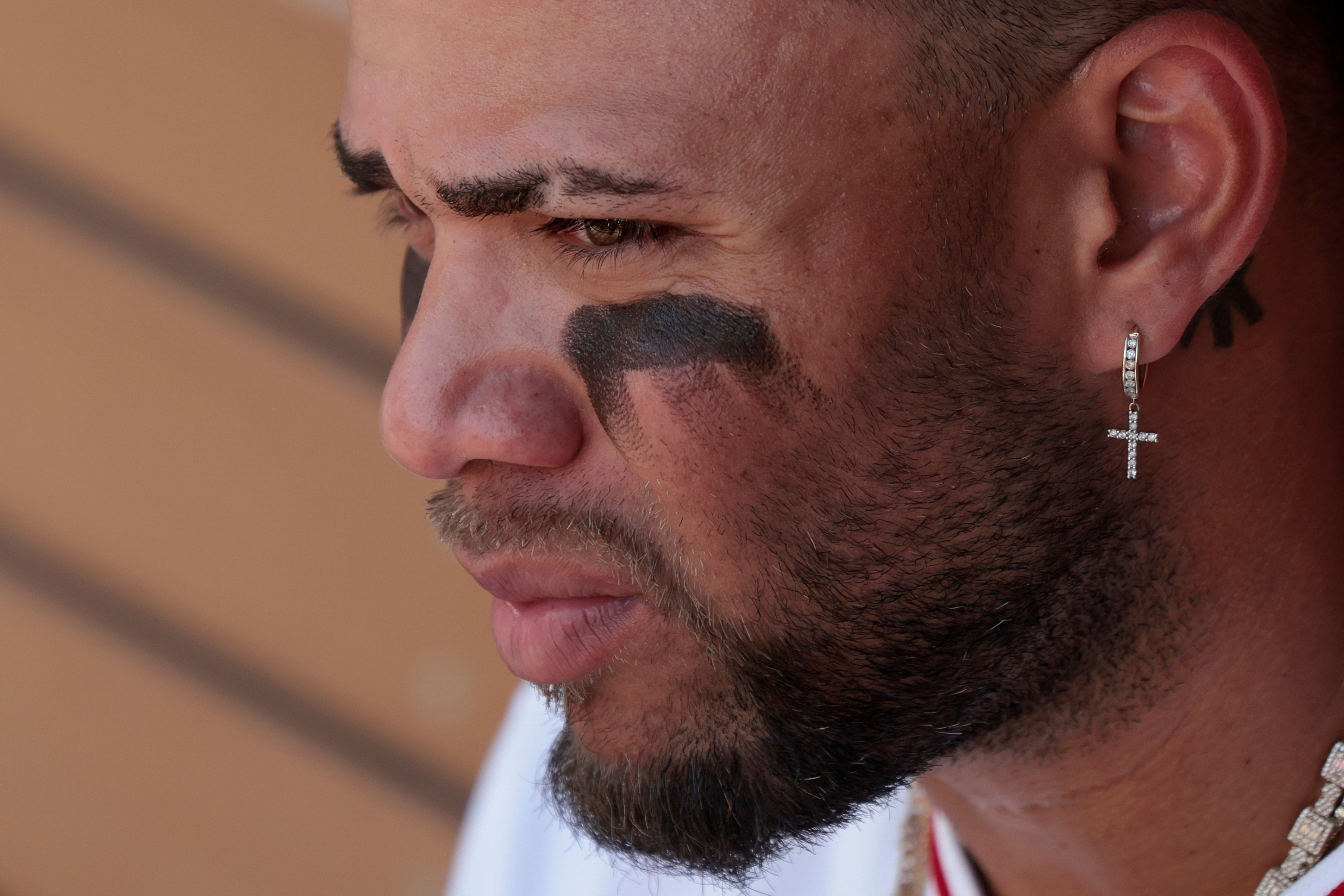 Angels’ Yoan Moncada (10) sits in the dugout during the...