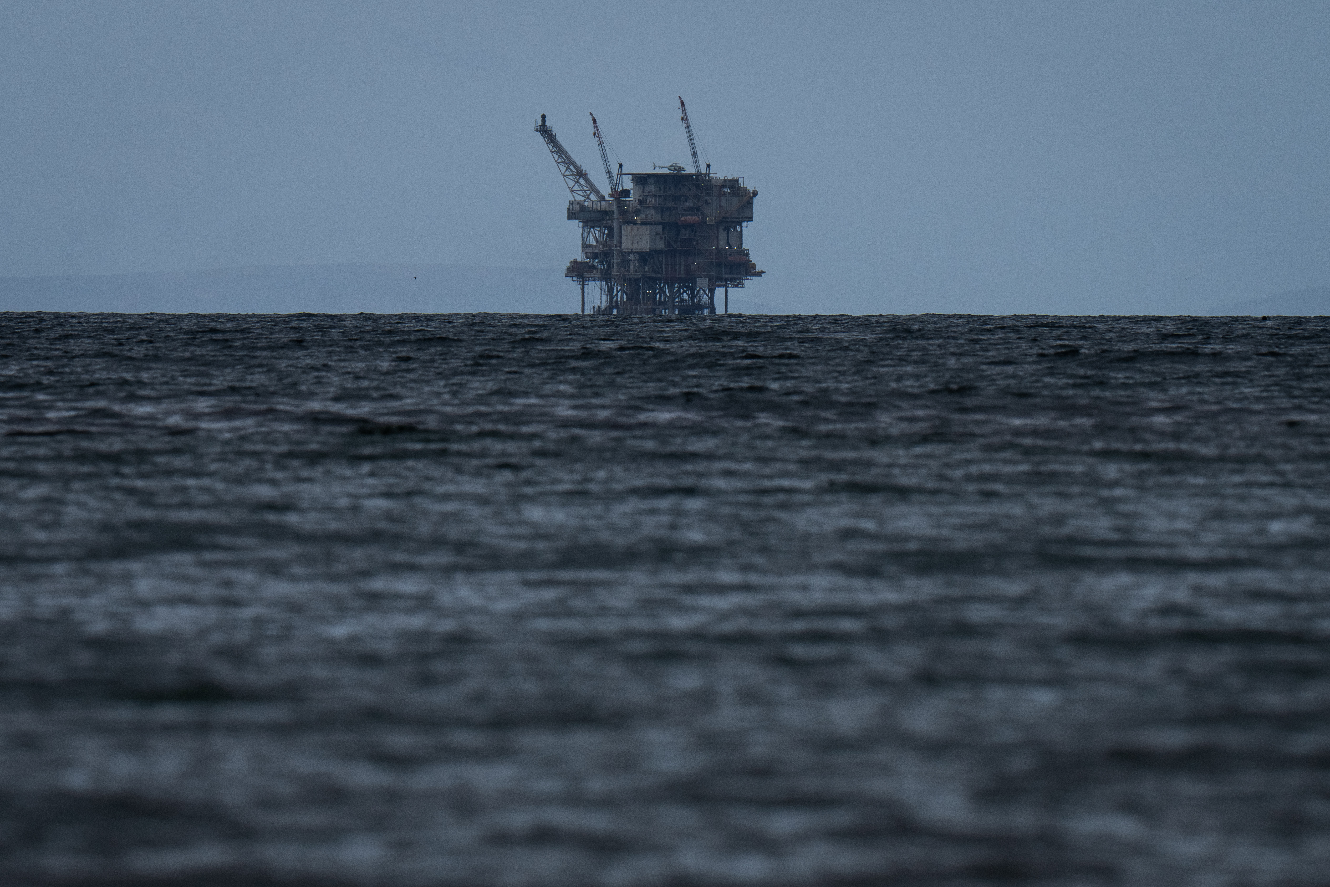 An offshore drilling platform operated by Sable Offshore Corp. is seen from Refugio State Beach